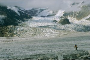 Bikers travel across the rough terrain and melt ice of southern Alaska